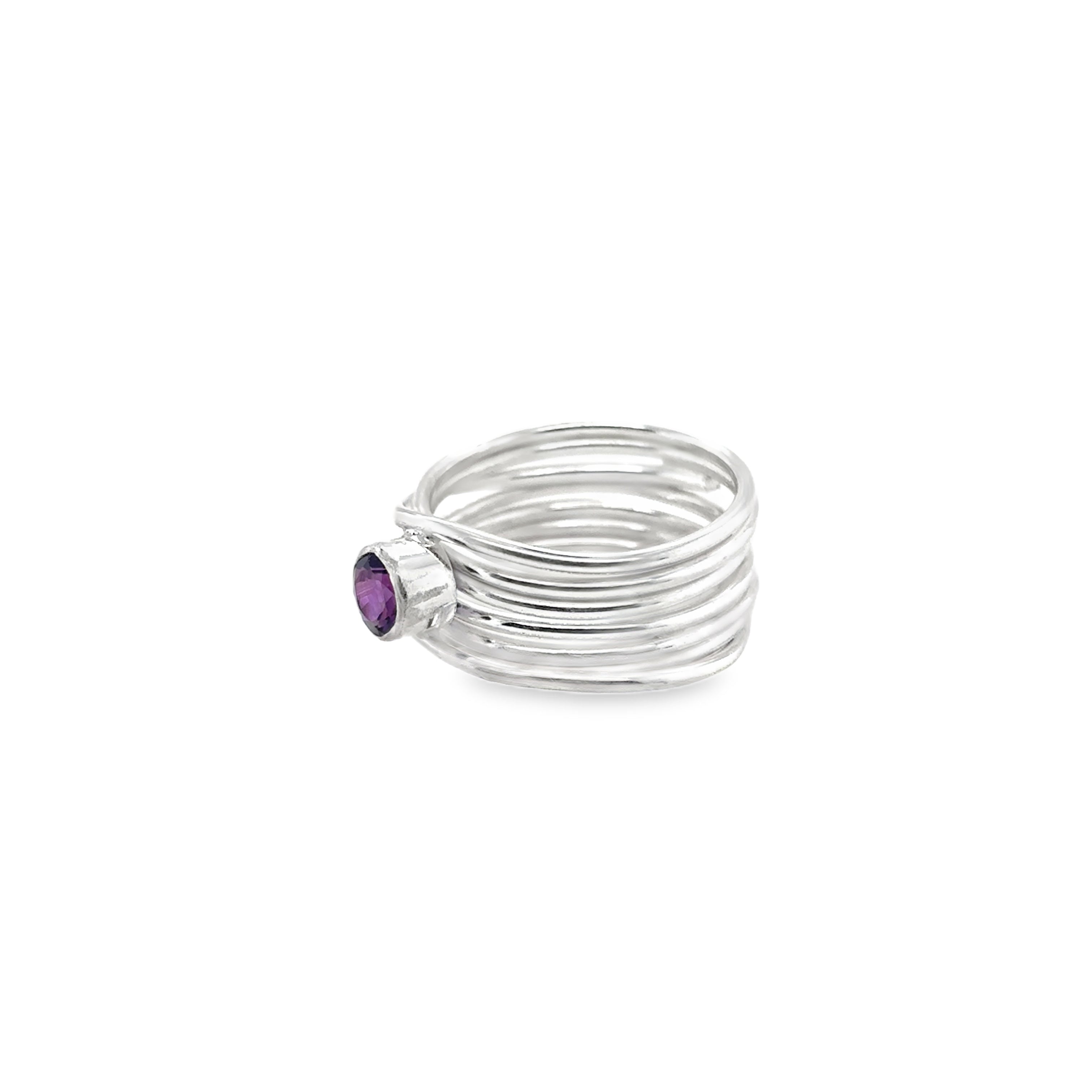 Faceted amethyst stone set on a silver 7 wrap Ring