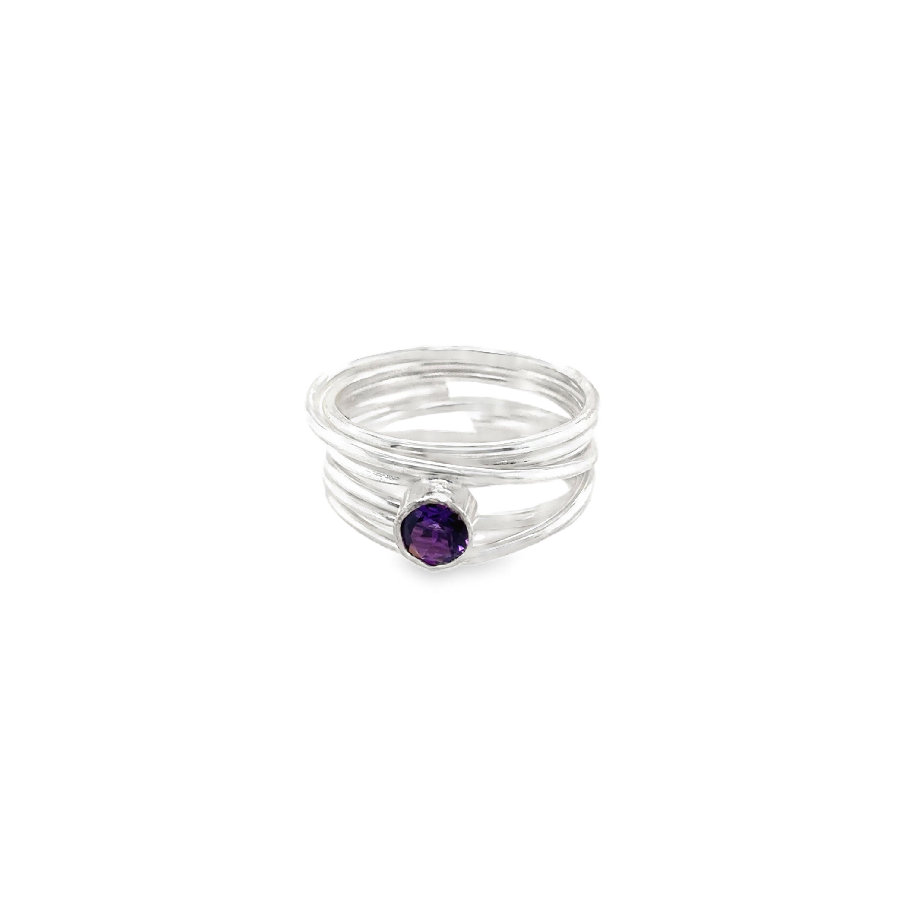 Faceted amethyst stone set on a silver 7 wrap Ring