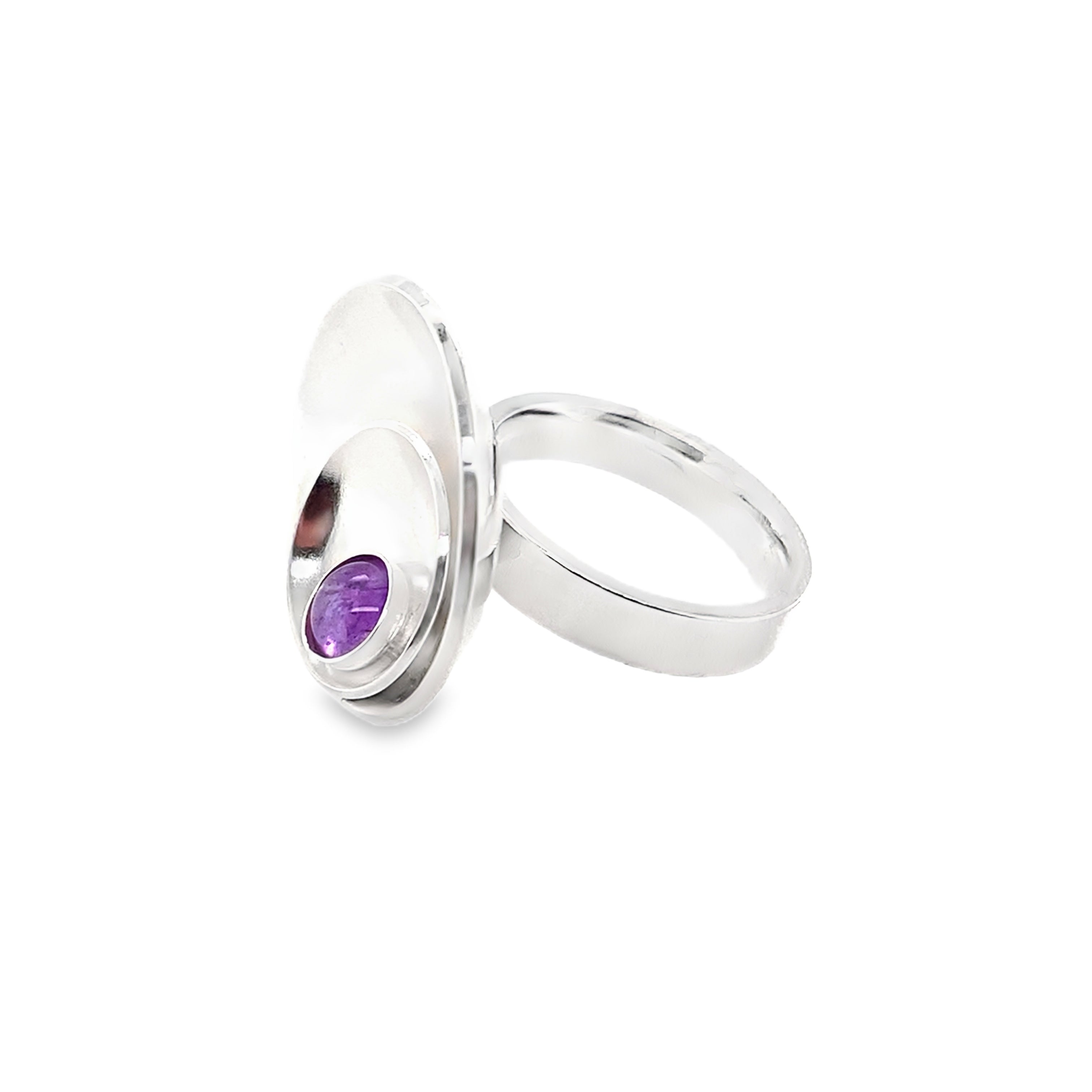 Amethyst set in a silver bezel on a 2 layer domed disc ring