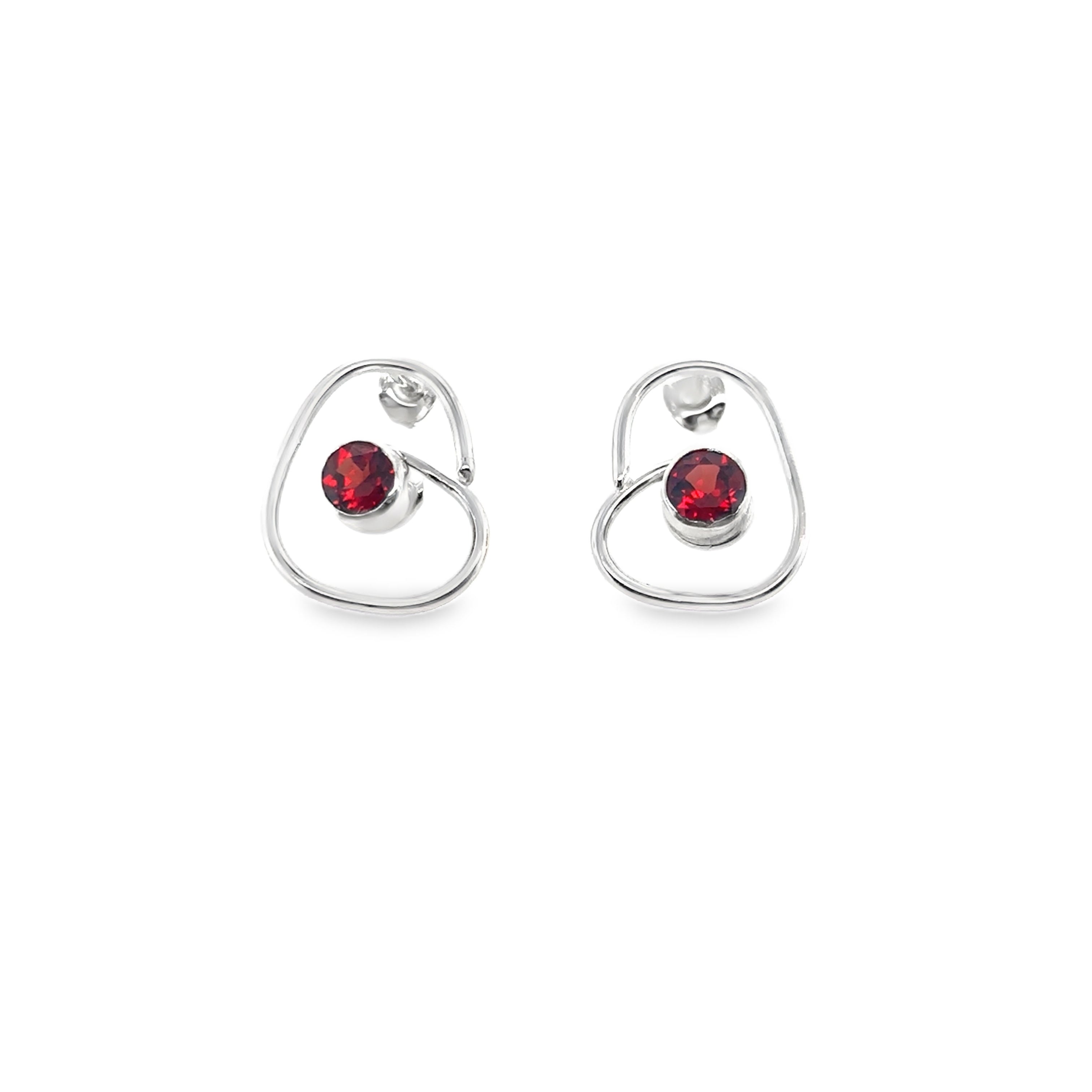 Faceted red garnet stones set on medium silver wrap studs