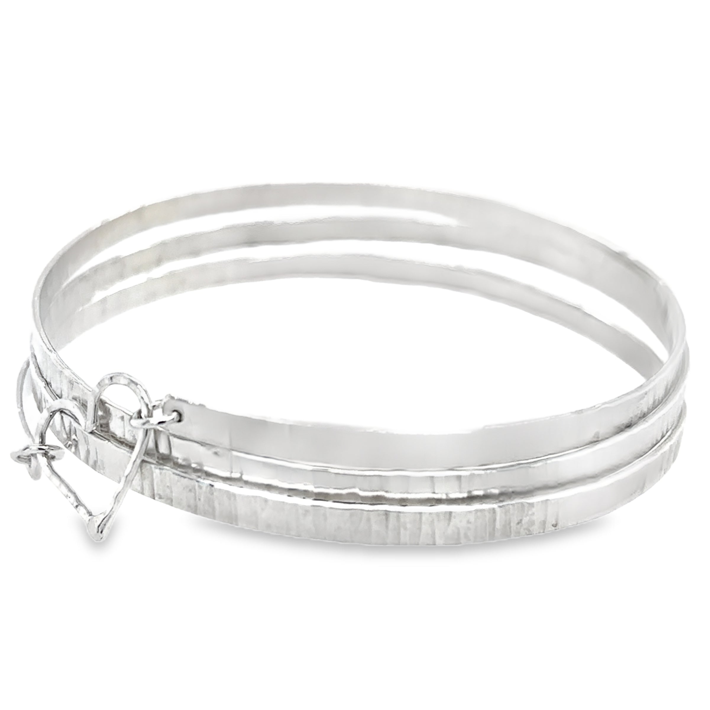 Hammered three spiral textured silver bangle with silver heart