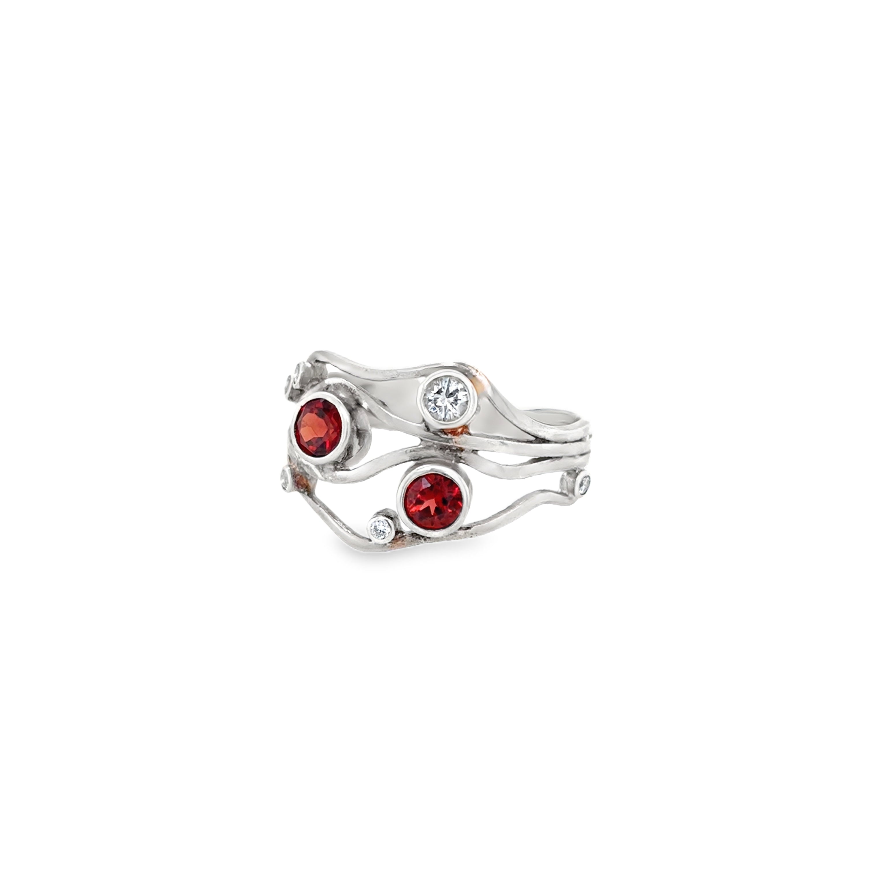 Multistone set on a multi banded shaped sterling silver ring