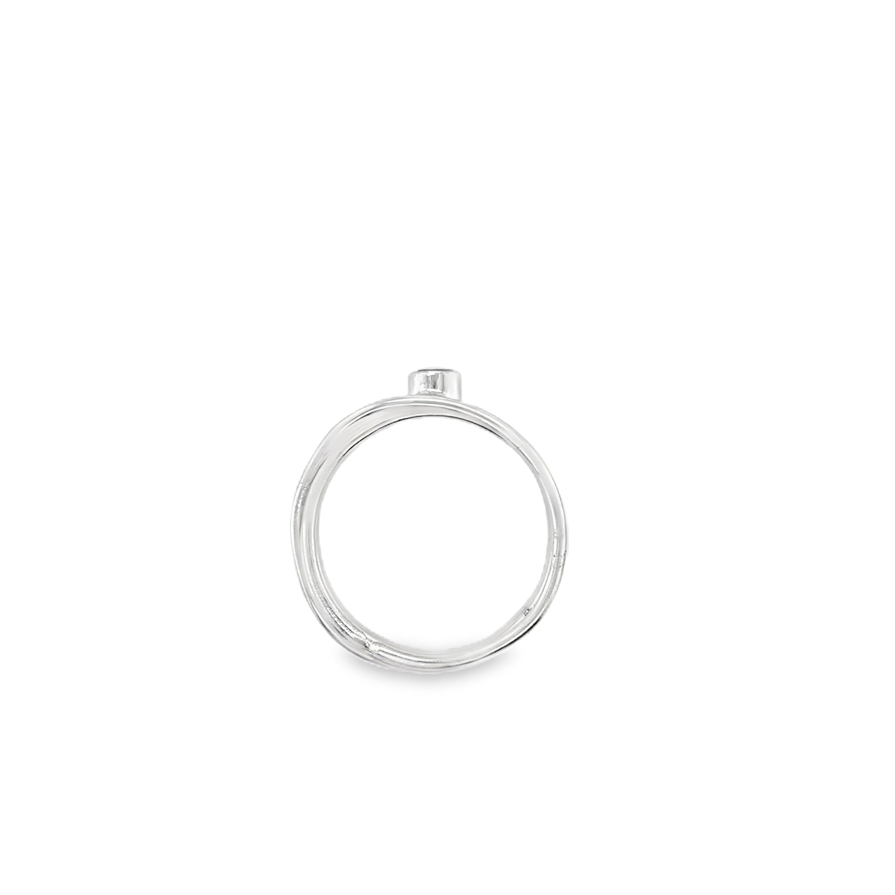 Faceted aqua marine stone set on a silver 5 wrap narrow Ring