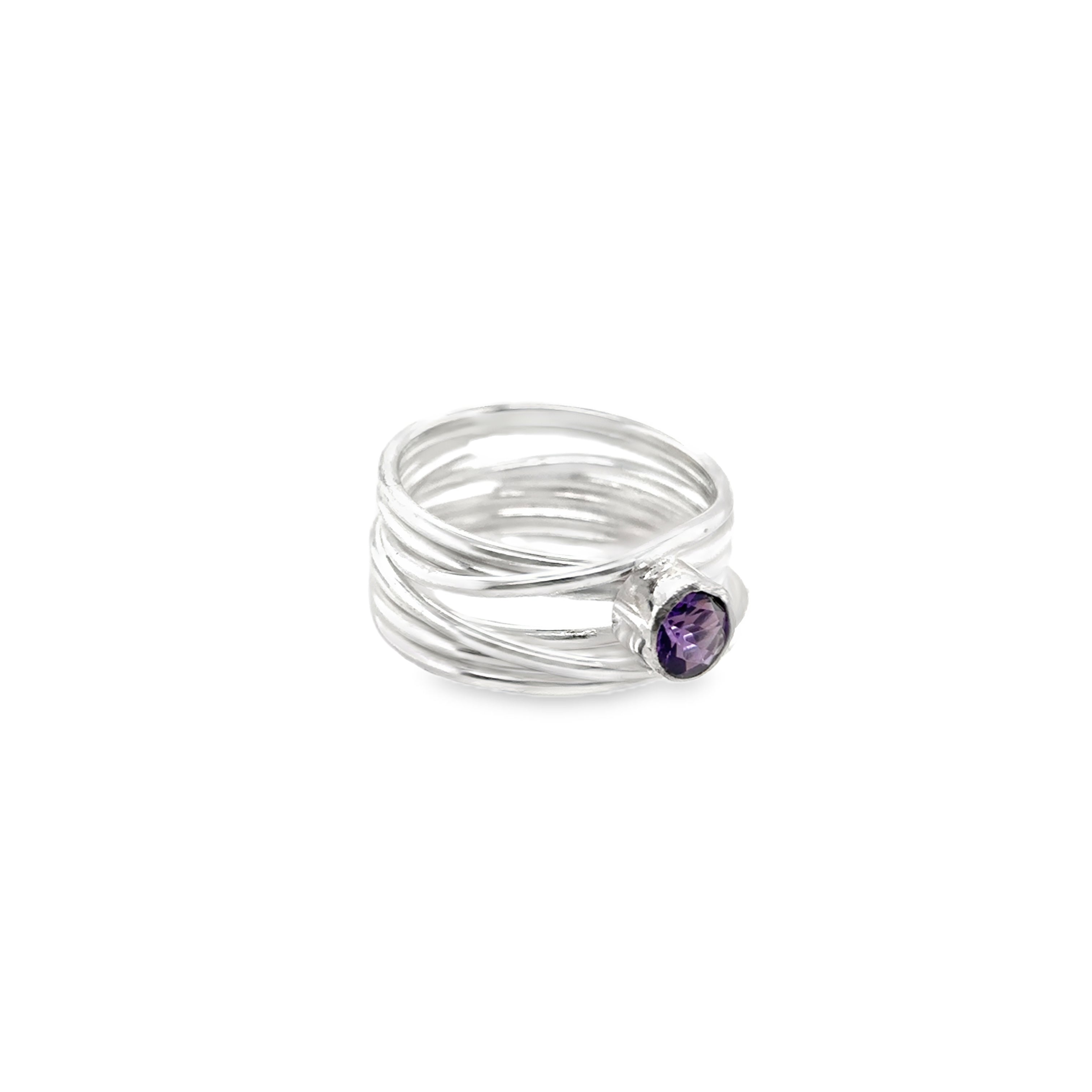 Faceted amethyst stone set on a silver 7 wrap Ring