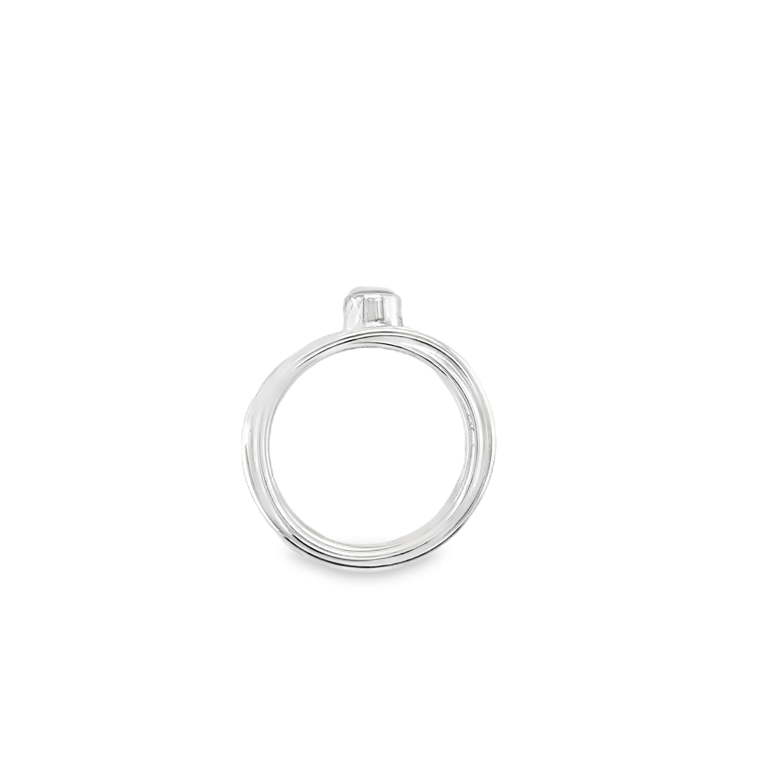Faceted London blue topaz stone set on a silver 7 wrap ring