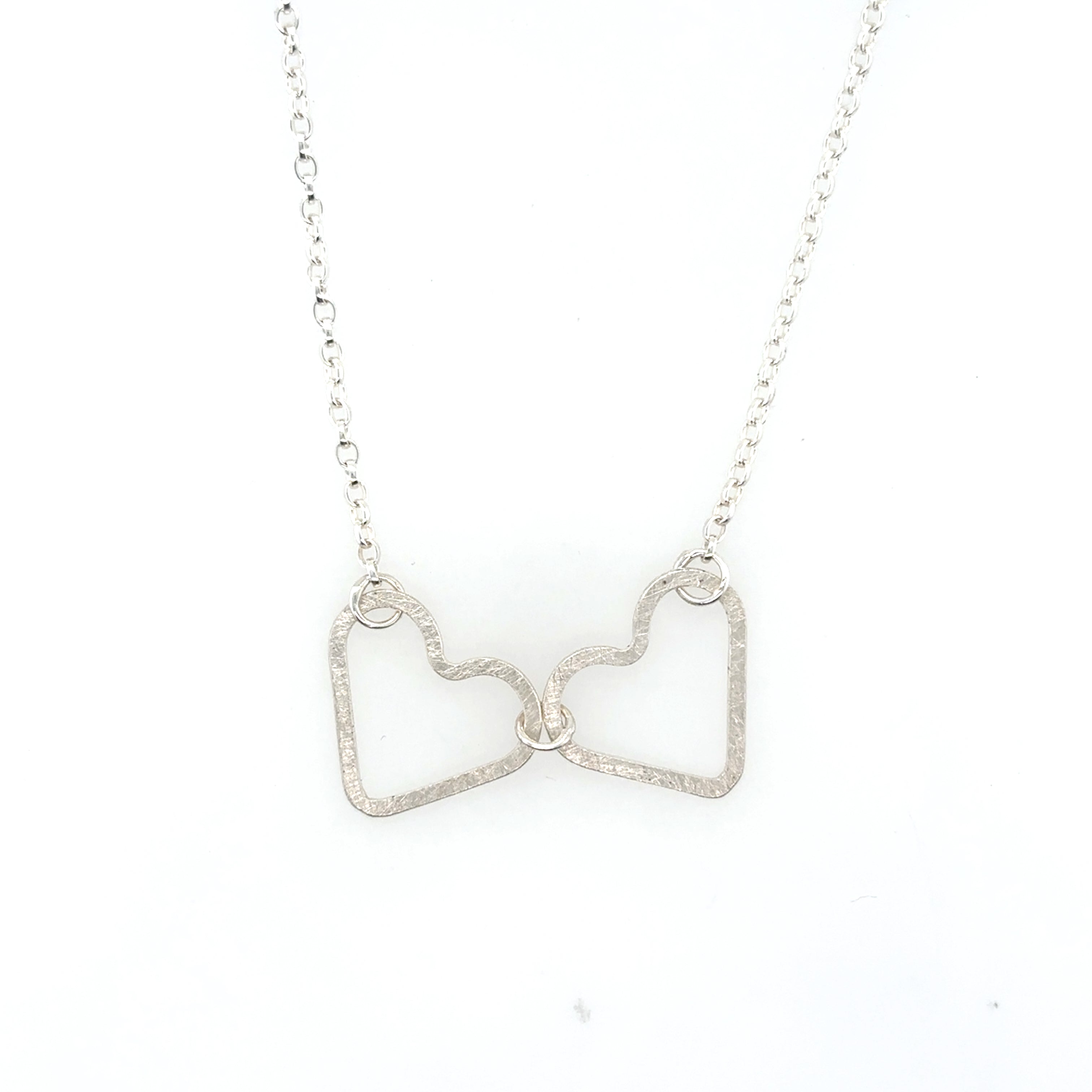Two linked flat silver heart Necklace