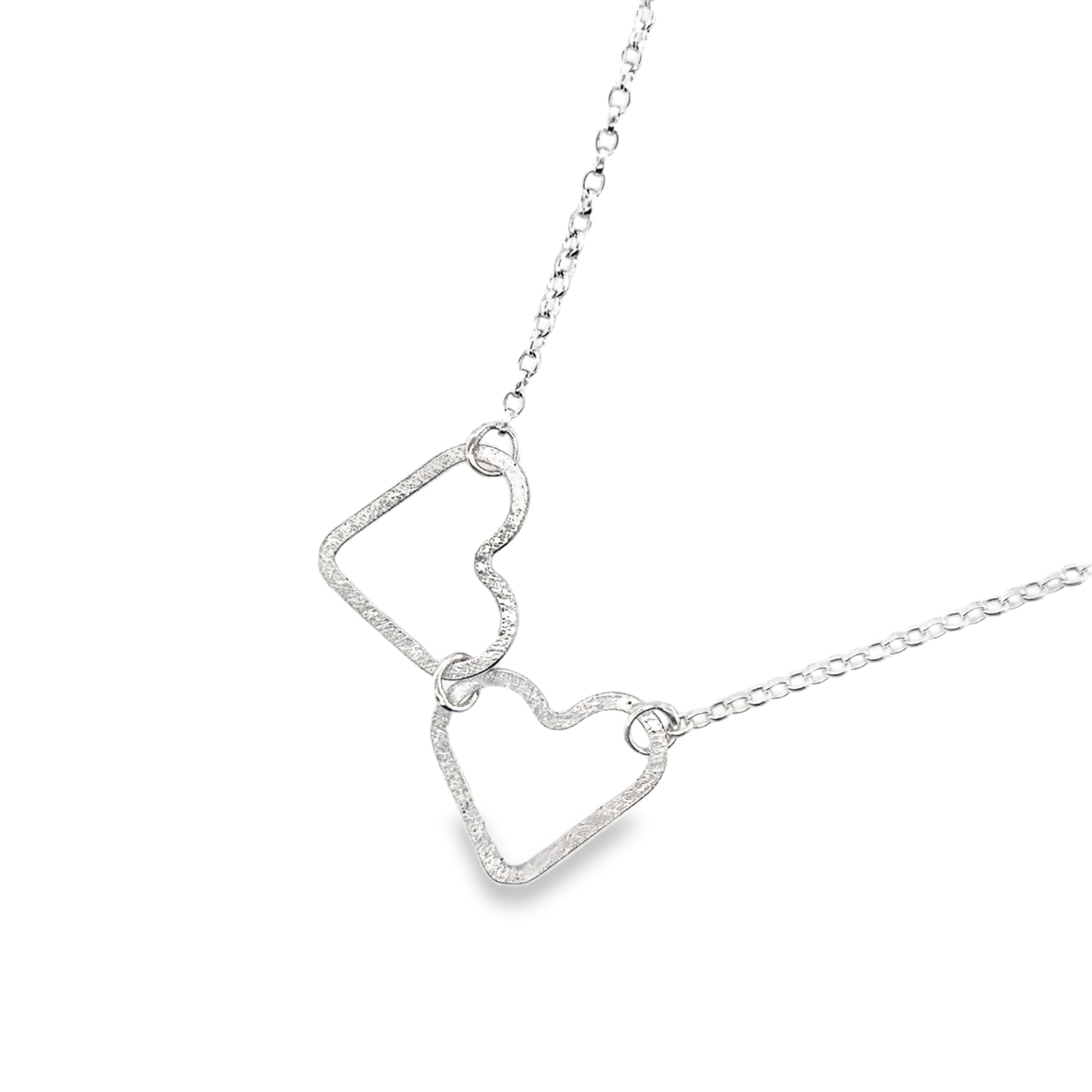 Two linked flat silver heart Necklace