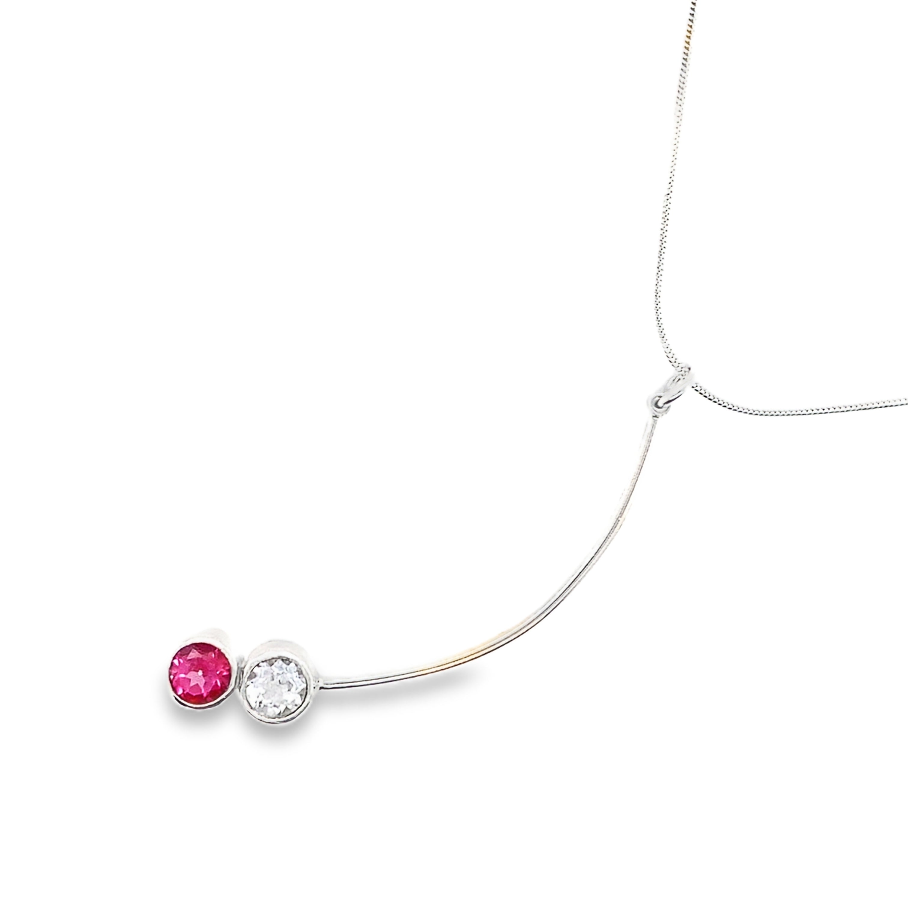 Silver stick necklace with white and pink topaz stones