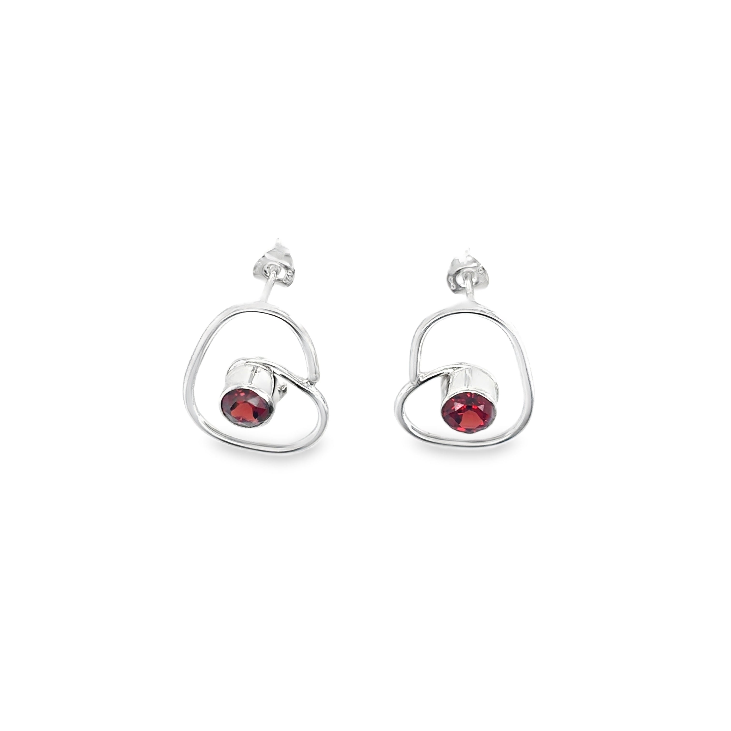 Faceted red garnet stones set on medium silver wrap studs