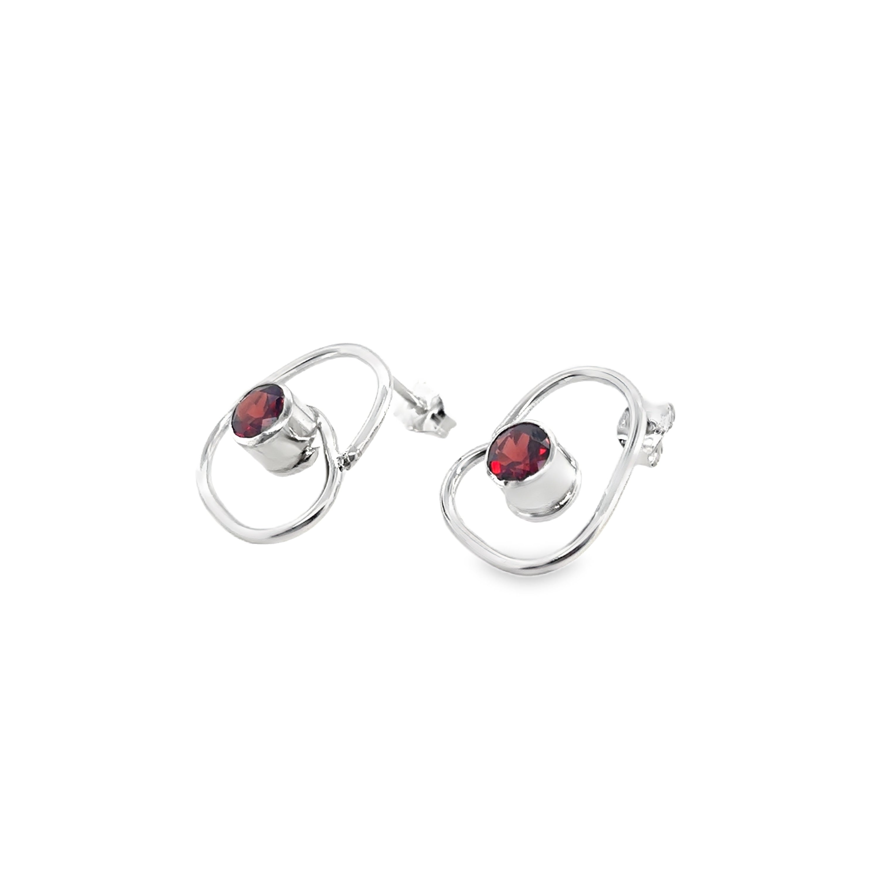 Faceted red garnet stones set on medium silver wrap studs