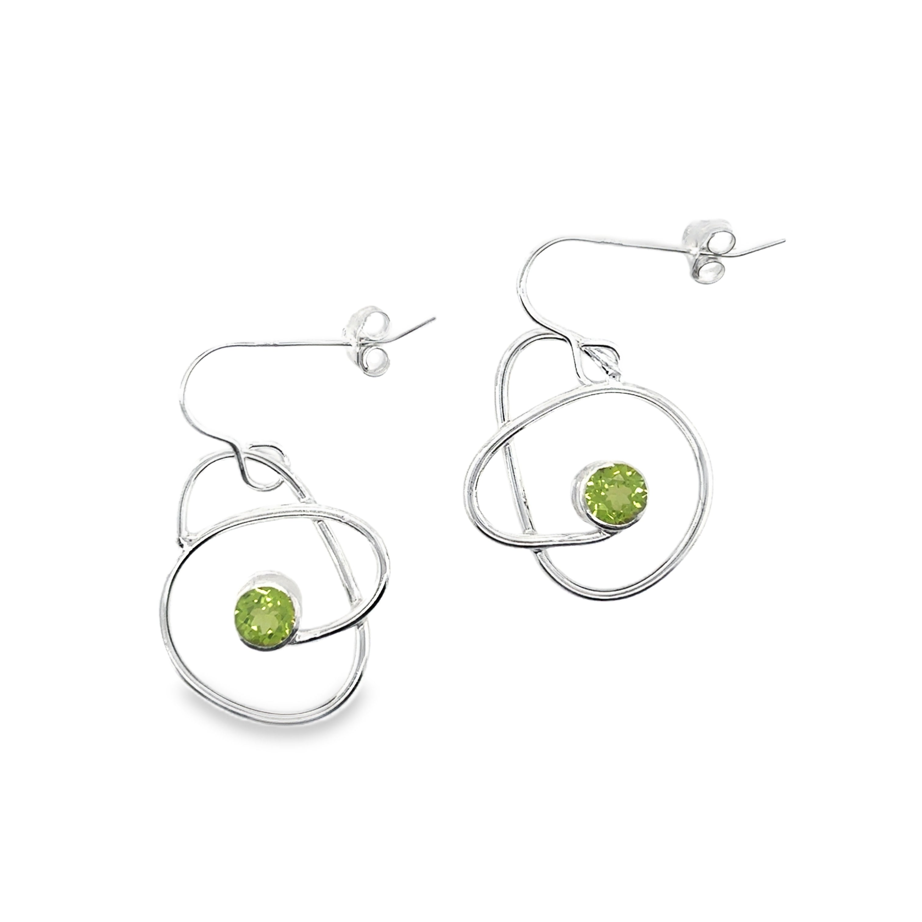 Peridot garnet stones set on medium silver wrap drop earrings