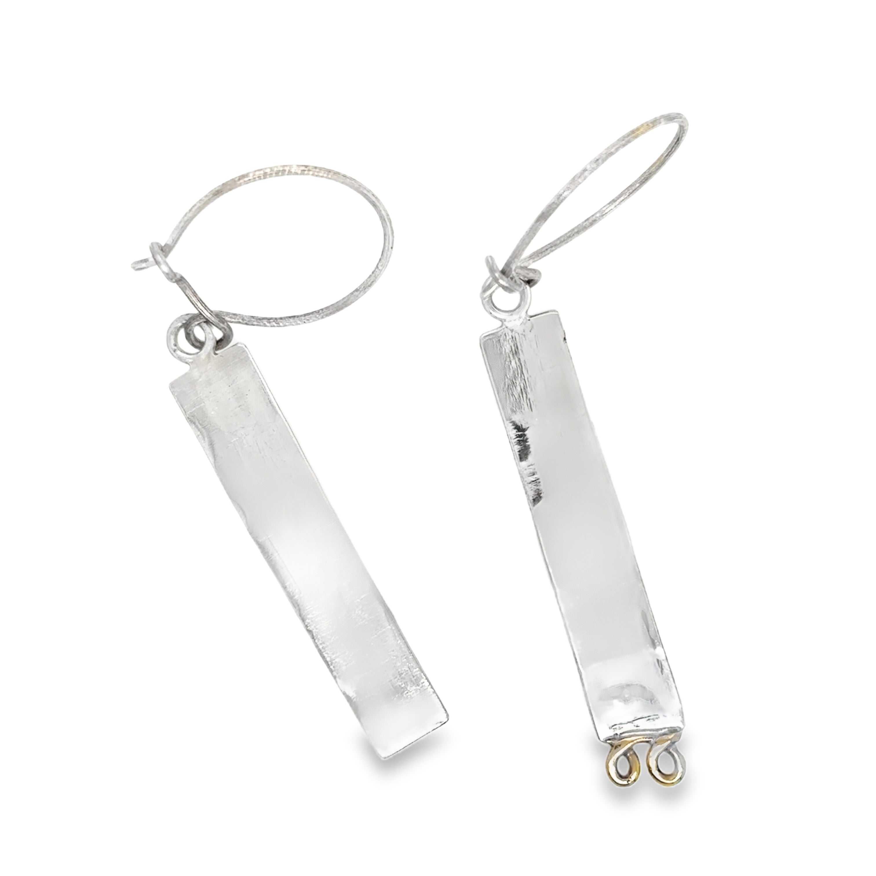 Long asymmetrical earrings