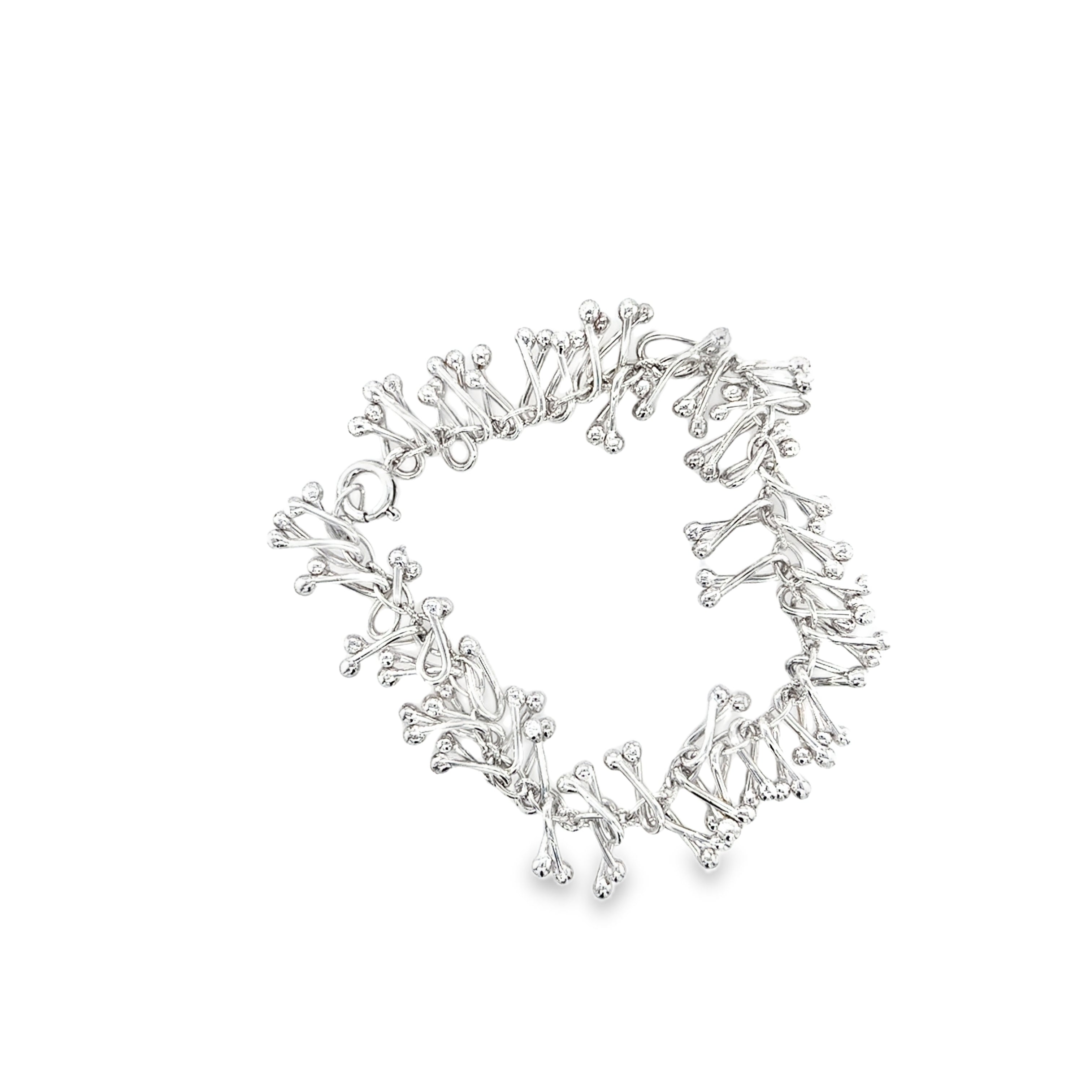 Droplets Twist opposites silver bracelet